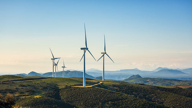 wind turbines on a hill top